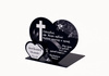 Podstawka pod znicz z podwójnym sercem oraz wyciętym krzyżem. Wykonana z czarnej matowej lub mlecznej pleksi