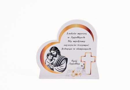 Podstawka pod znicz w kształcie serca z wyciętym krzyżem. Wykonana z mlecznej pleksi