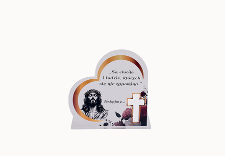 Podstawka pod znicz w kształcie serca z wyciętym krzyżem. Wykonana z mlecznej pleksi