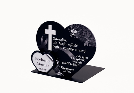 Podstawka pod znicz z podwójnym sercem oraz wyciętym krzyżem. Wykonana z czarnej matowej lub mlecznej pleksi
